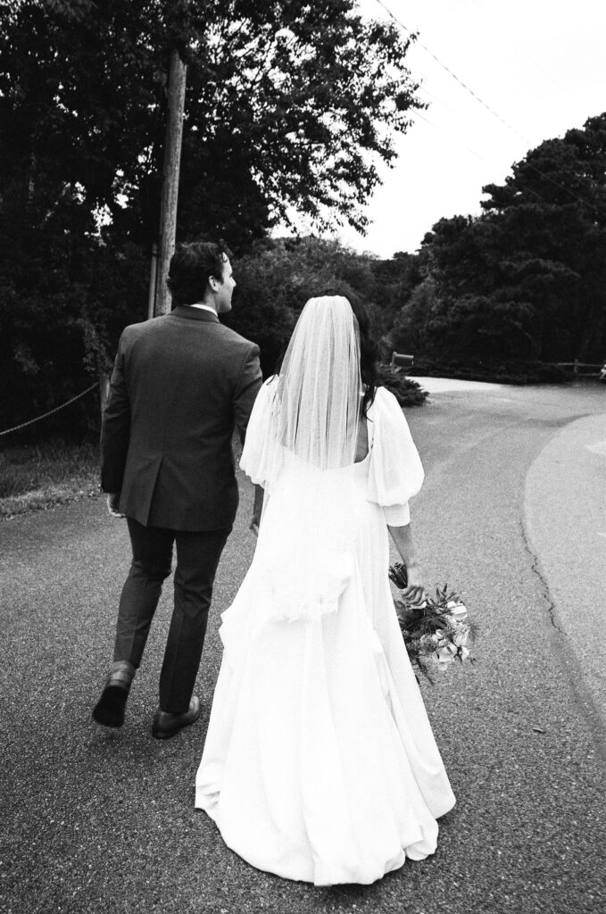 Bride and groom on wedding day in Cape Cod by New England wedding film photographer Chris Mongeau