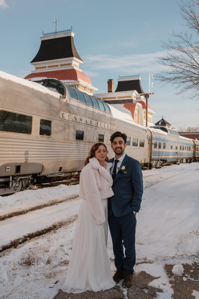 Bride and groom at the Conway Scenic Railroad train