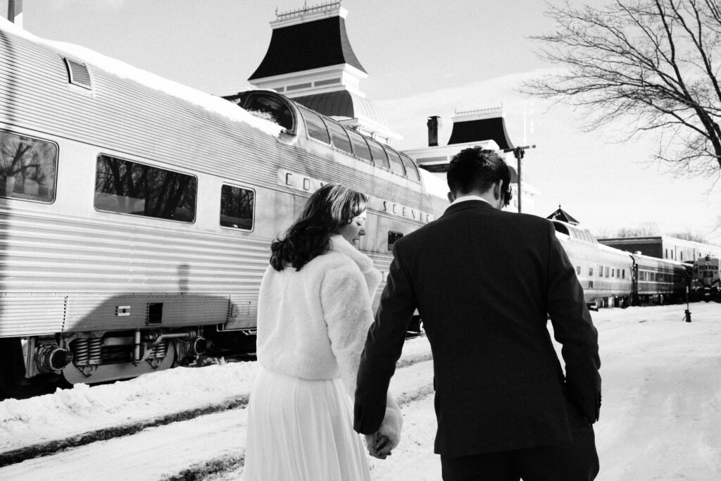 Bride and groom outside Conway Scenic Railway station in North Conway, NH