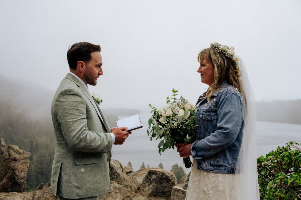Bride and groom sharing vows during their Emerald Bay elopement at Lake Tahoe